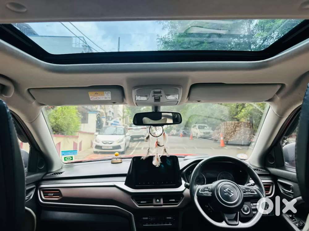 Maruti Suzuki Brezza 1.5 Zxi Plus Smart Hybrid Dual Tone, 2023, Petr..