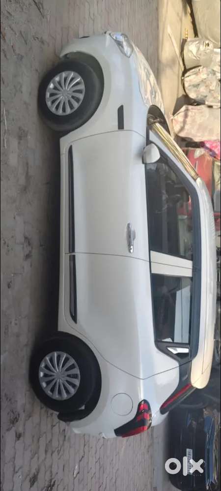 Maruti Swift Lxi 2023 . Convert Vxi