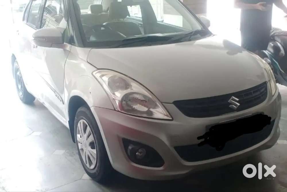Maruti Suzuki Dzire 2014 Petrol Variant Cng Outside Fitted