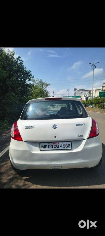 Maruti Suzuki Swift Lxi Optional-o, 2016, Petrol
