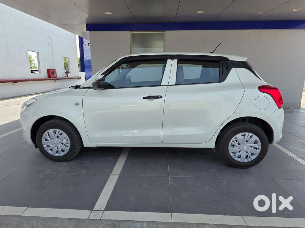 Maruti Suzuki Swift 1.2 Lxi (o), 2024, Petrol