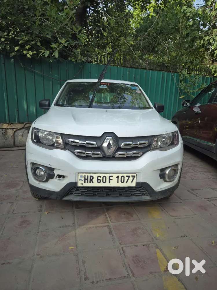 A Renault Kwid Rxt 0.8 In White Colour Only 30,000 Km Driven Hr Number