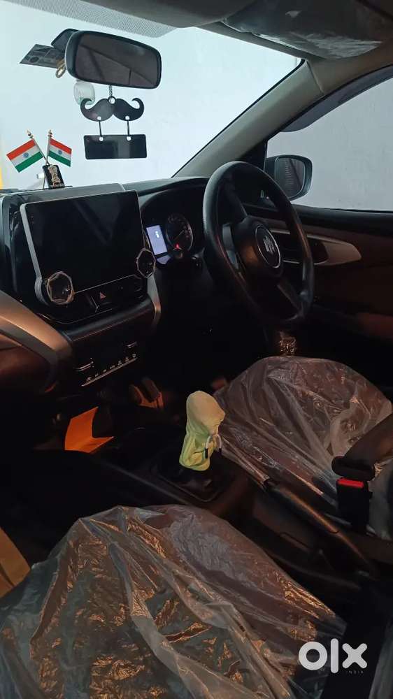 2026 Maruti Fronx Sigma 1.2 Petrol  Only 5,200 Km  Splendid Silver