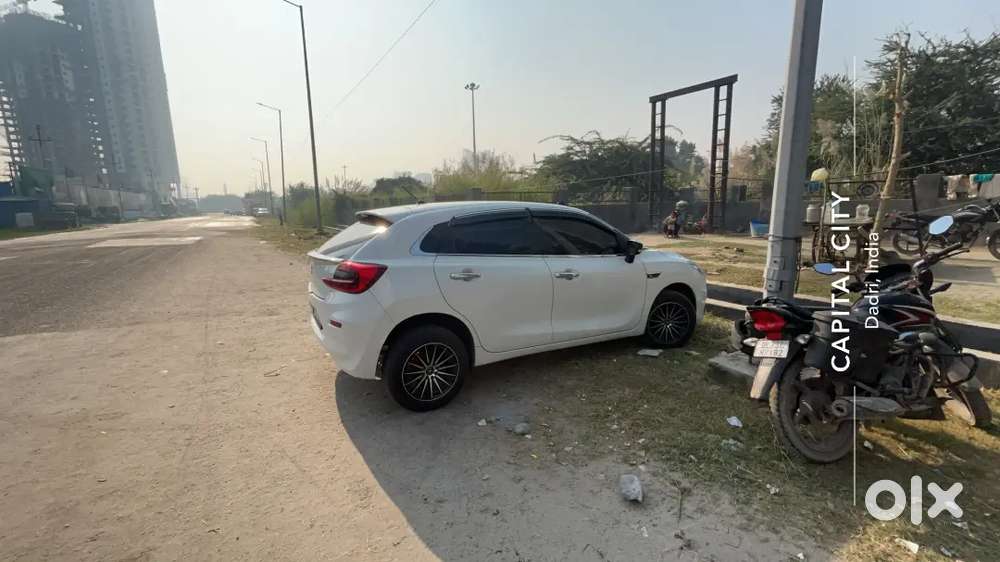 Baleno 2023 Petrol 1st Owner White Alloy Wheels Led Light Music System