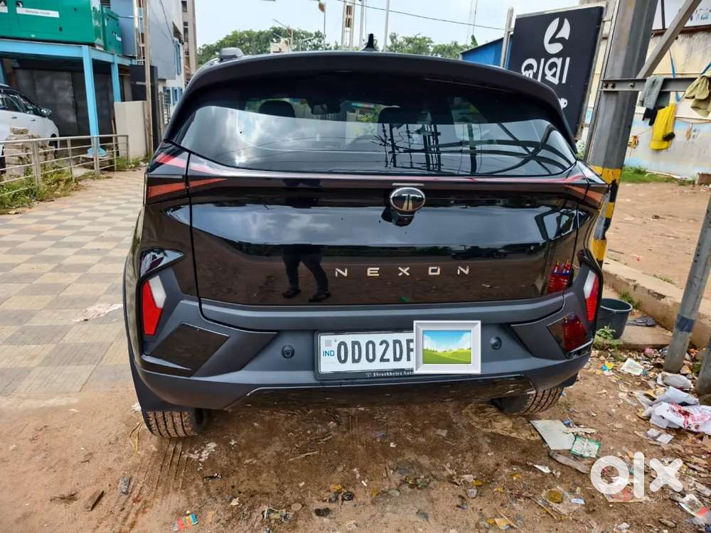 Tata Nexon Creative Plus +s Dark At Petrol 2025