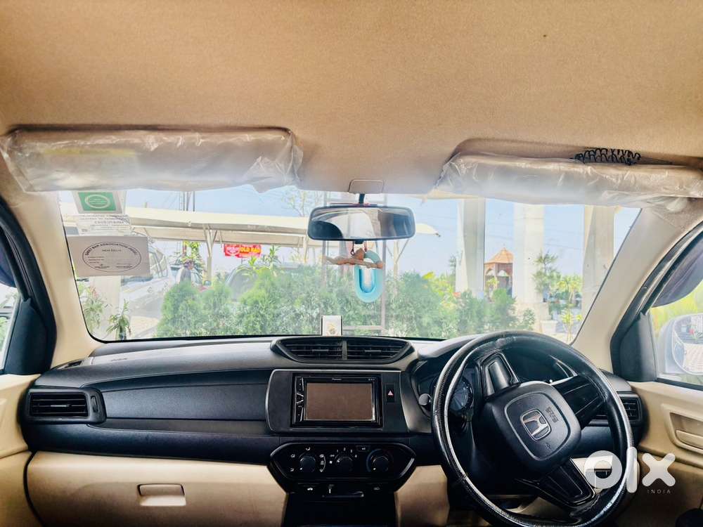 Honda Amaze Petrol/cng  2019  64000 K.m Driven  Hr 87 Reg.