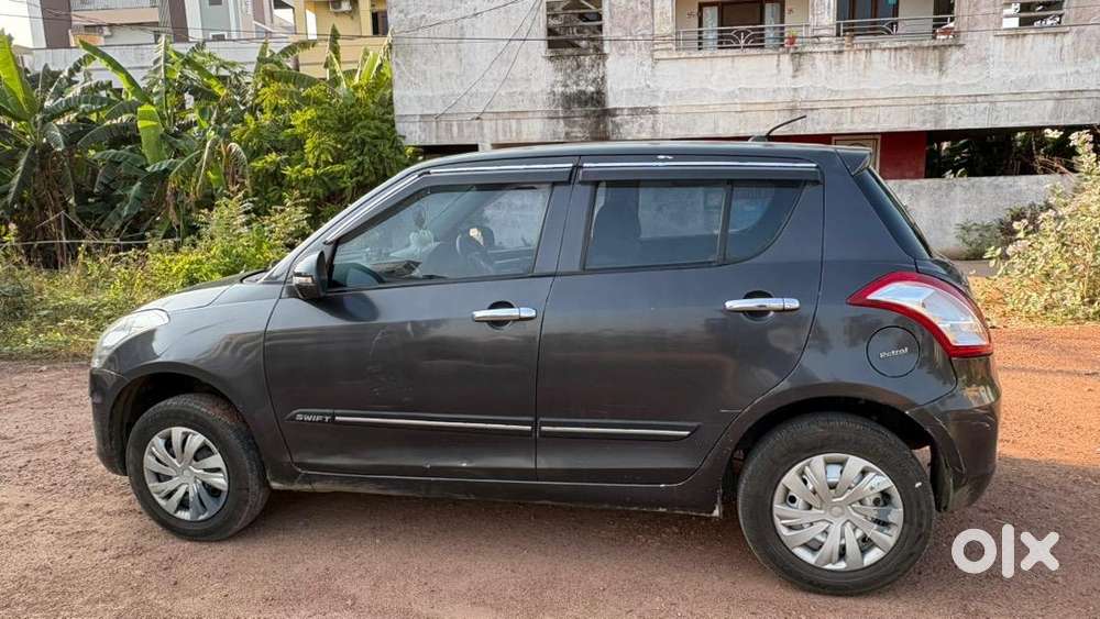 Maruti Suzuki Swift 2016 Vxi Petrol , Dark Grey ,well