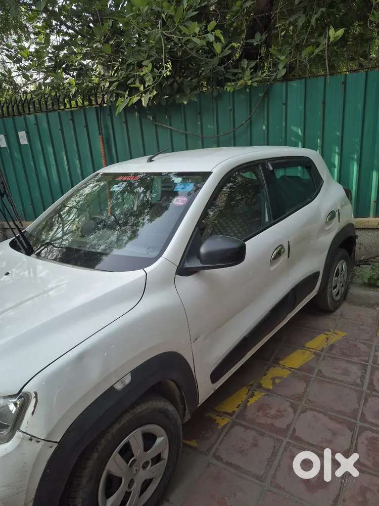 A Renault Kwid Rxt 0.8 In White Colour Only 30,000 Km Driven Hr Number