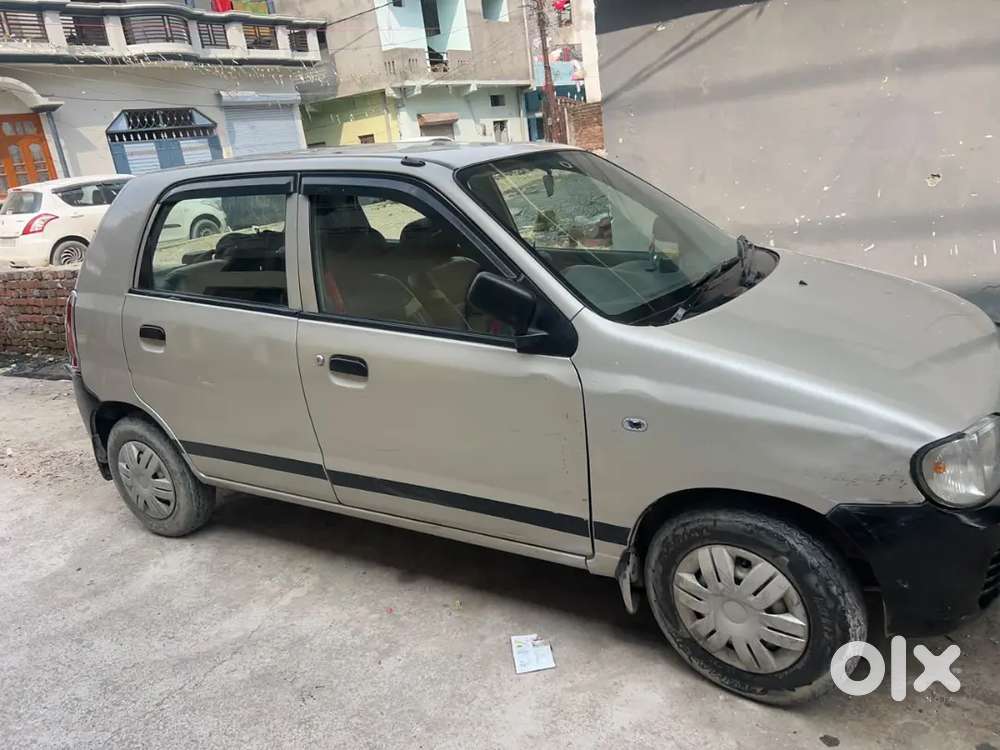 Maruti Suzuki Alto 2009 Petrol Well Maintained And Central Lock Key.