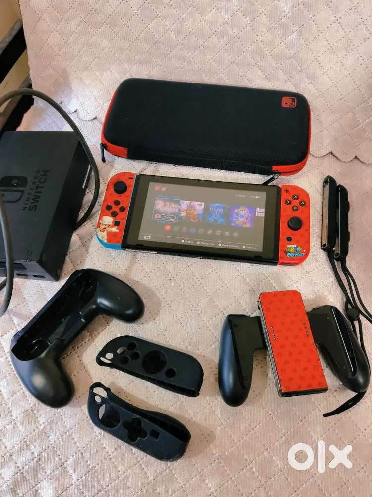 Nintendo switch 128gb with 5-6 top games and all accessories