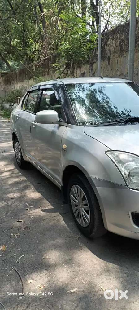 Maruti Dzire 1.2 Vxi 2011december  Third Owner