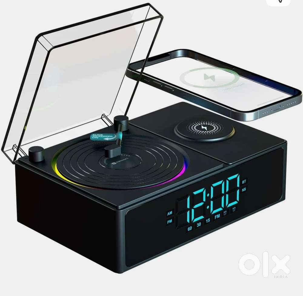 Brand new Portronics bluetooth speaker with wireless charger + clock