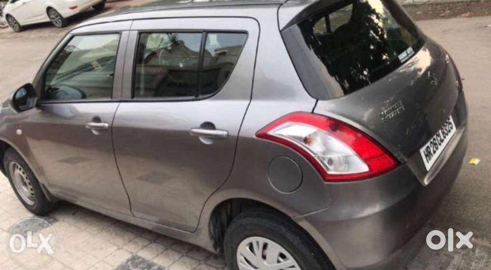 Swift Lxi 2015 Km Driven
