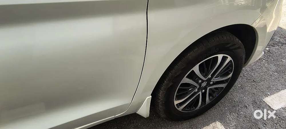 Ertiga Zxi (0) Cng Top Model