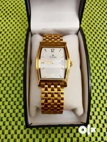 Titan pure gold hot sale watch price