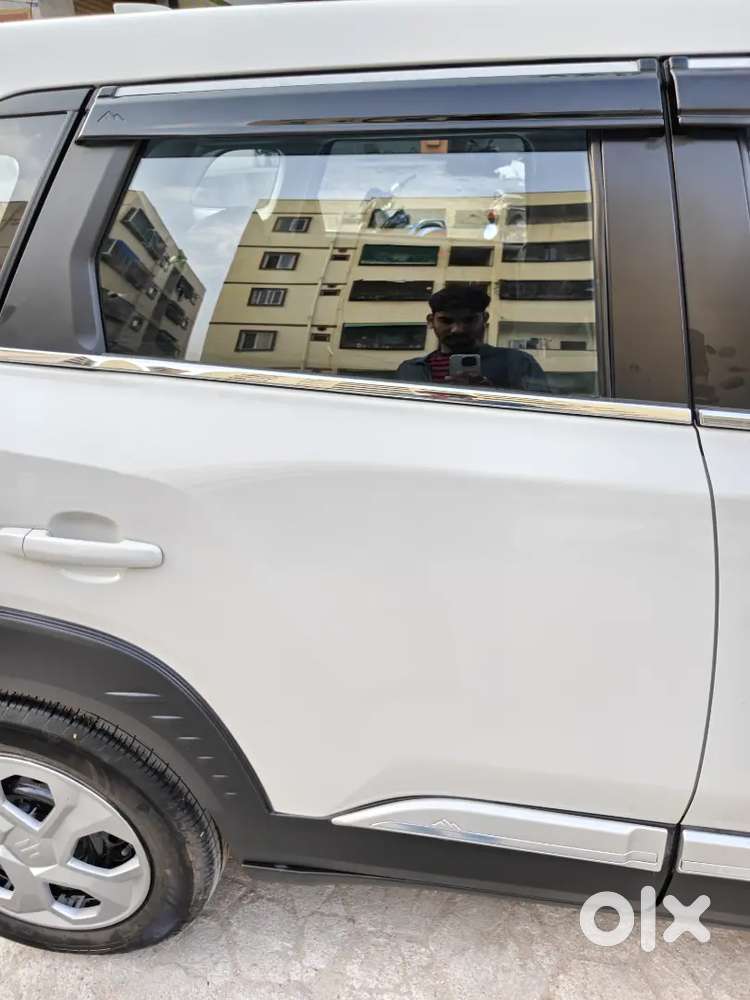 2025 Maruti Suzuki Brezza Lxi Petrol  5,000 Km  1st Owner