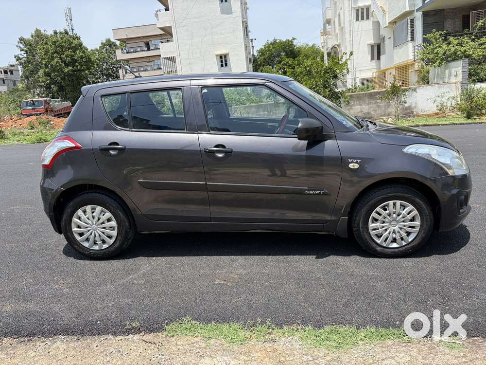 Maruti Suzuki Swift Lxi Optional-o, 2015, Petrol