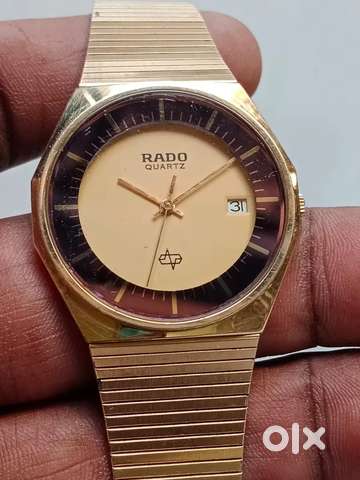 Rado watch 2024 golden colour