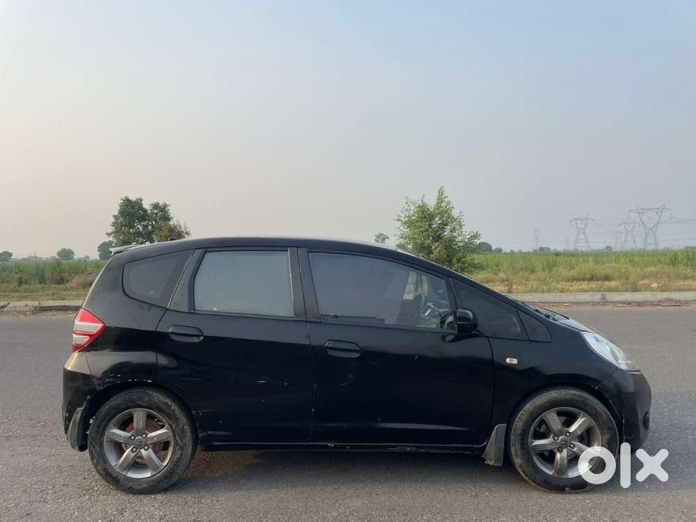 Honda Jazz 2012 Top Model | Petrol + Cng | Black | Alloy Wheels