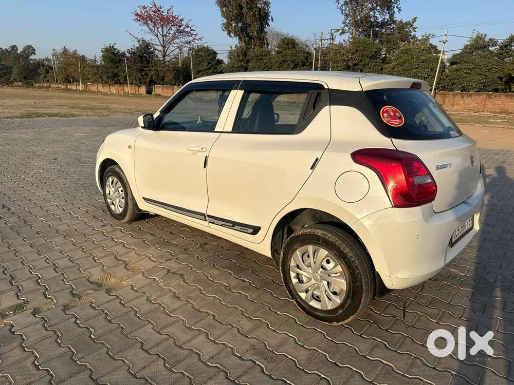 Maruti Suzuki Swift 1.2 Lxi (o), 2023, Petrol