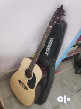 Guitar olx store near me