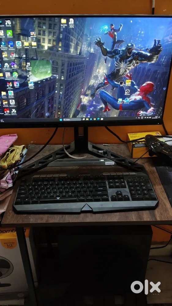 table and Lenovo Legion FHD 240 Hz Gaming Monitor 24