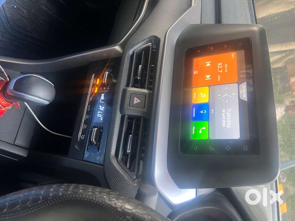 Breeza, October 2025,vxi Hybrid Automatic, Driven 6 Months