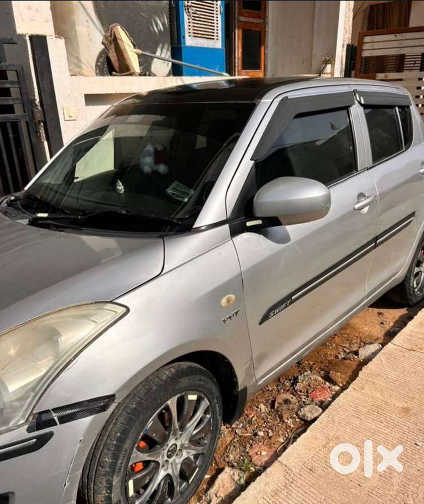 Swift 1.2 Lxi 2011 Km Driven