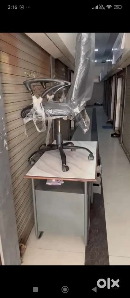 Wooden base office table with chair