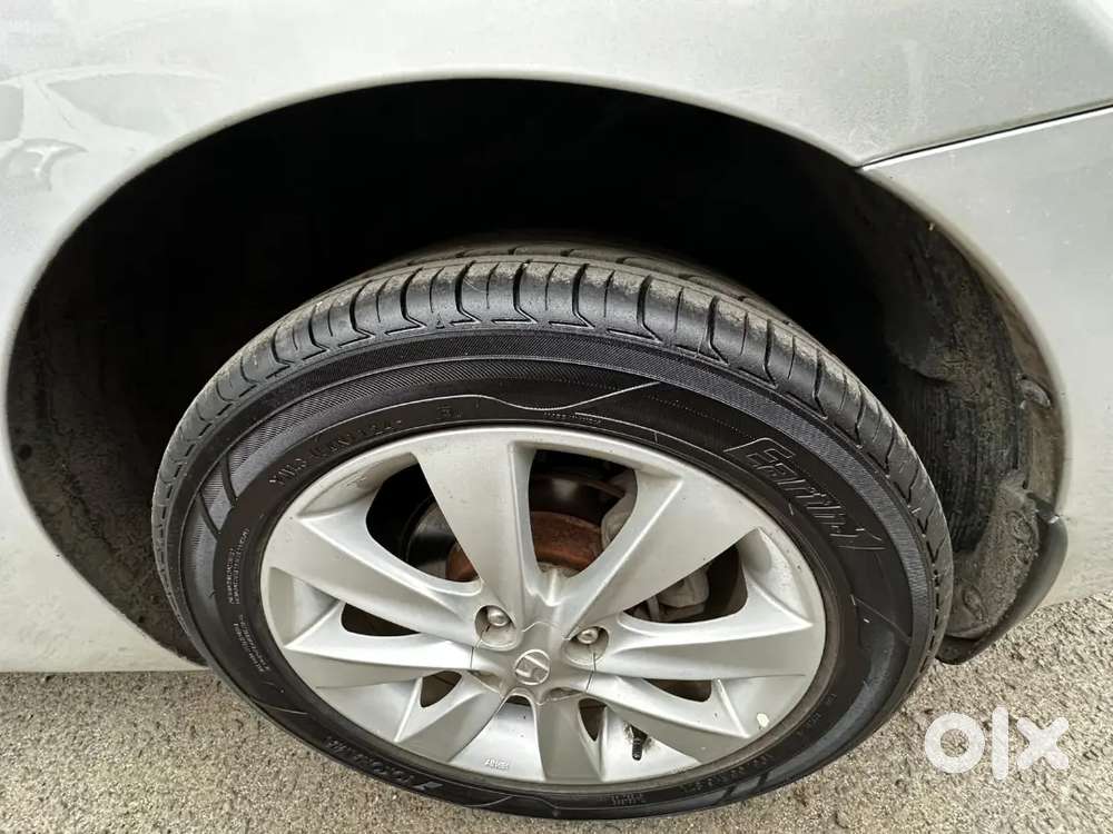 Only 26k Km Driven.with Service Record. 2 Keys Available