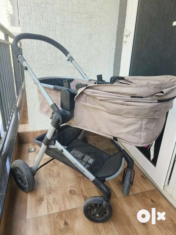 Evenflo pivot on sale travel system sandstone