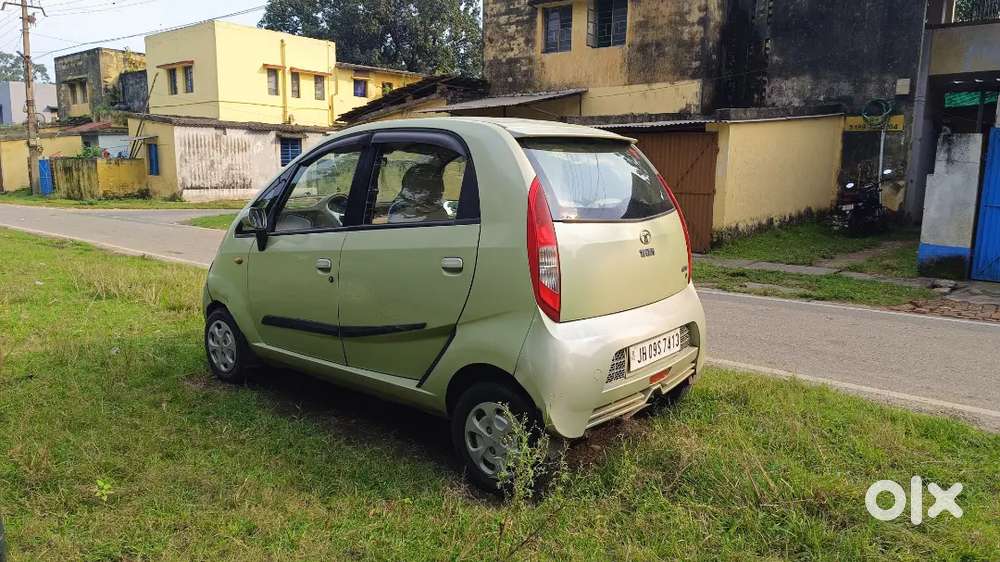 Tata Nano Lx 2012 Magenta Green Colour