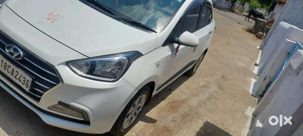 Hyundai Xcent Cng + Petrol  40,000 Km  32 Km/kg Mileage  Excellent