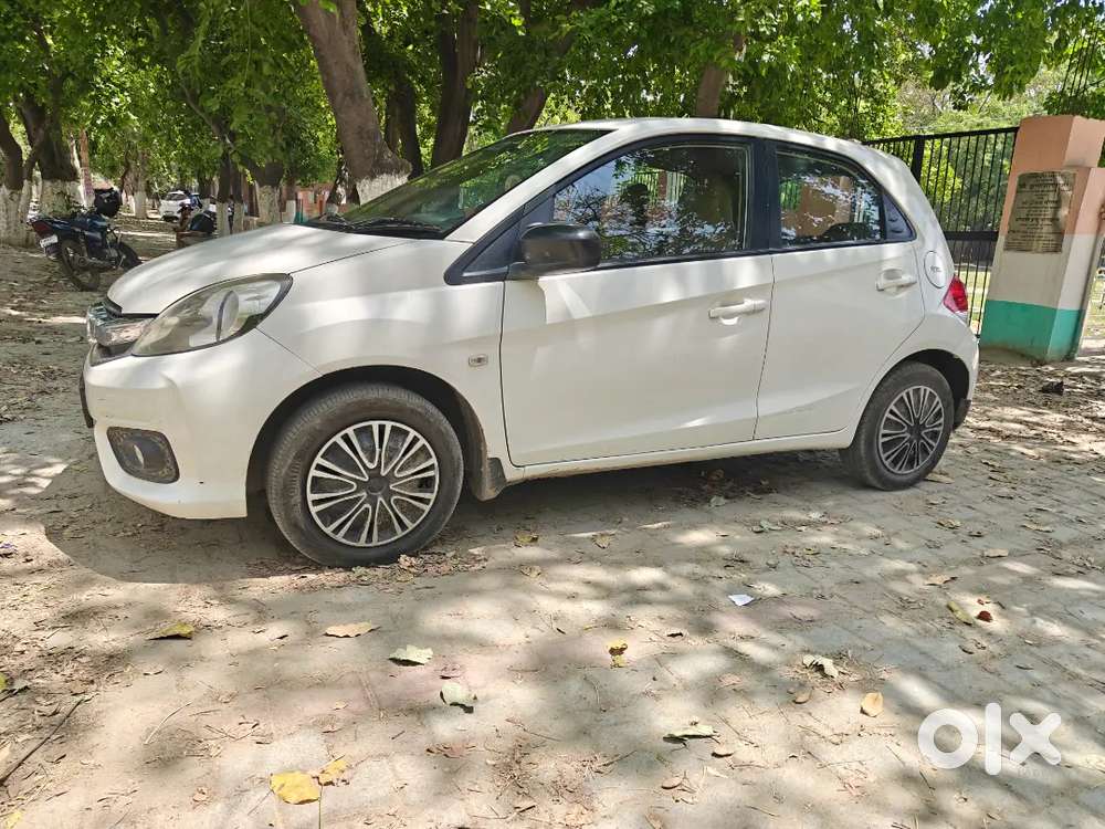 White Honda Brio 2017 With Sequential Cng On Paper In Good Condition.