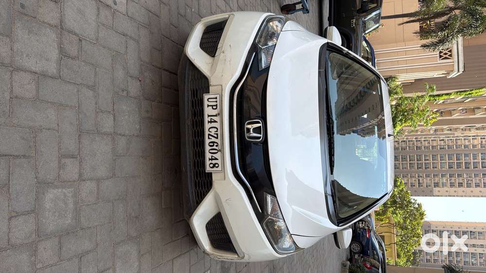 White Honda Jazz Available For Immediate Selling