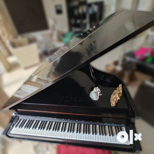 Grand piano deals olx