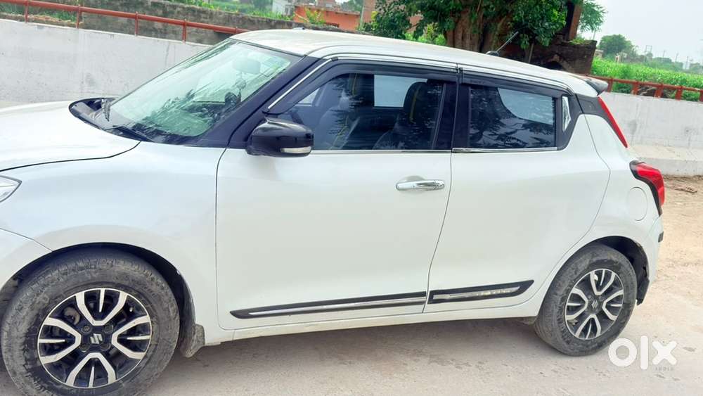 Swift Vxi 2021 Km Driven