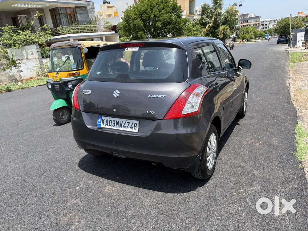 Maruti Suzuki Swift Lxi Optional-o, 2015, Petrol