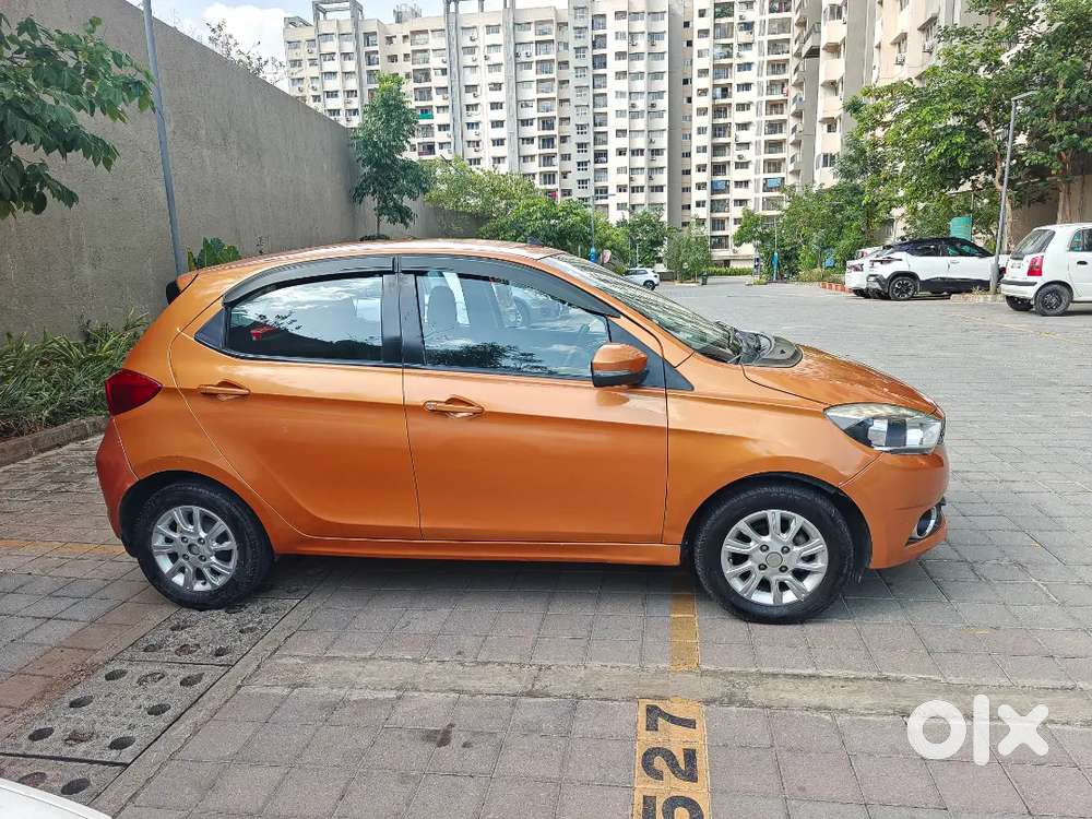 Tata Tiago 2018 Xza In Sunburst Orange With First Party Insurance