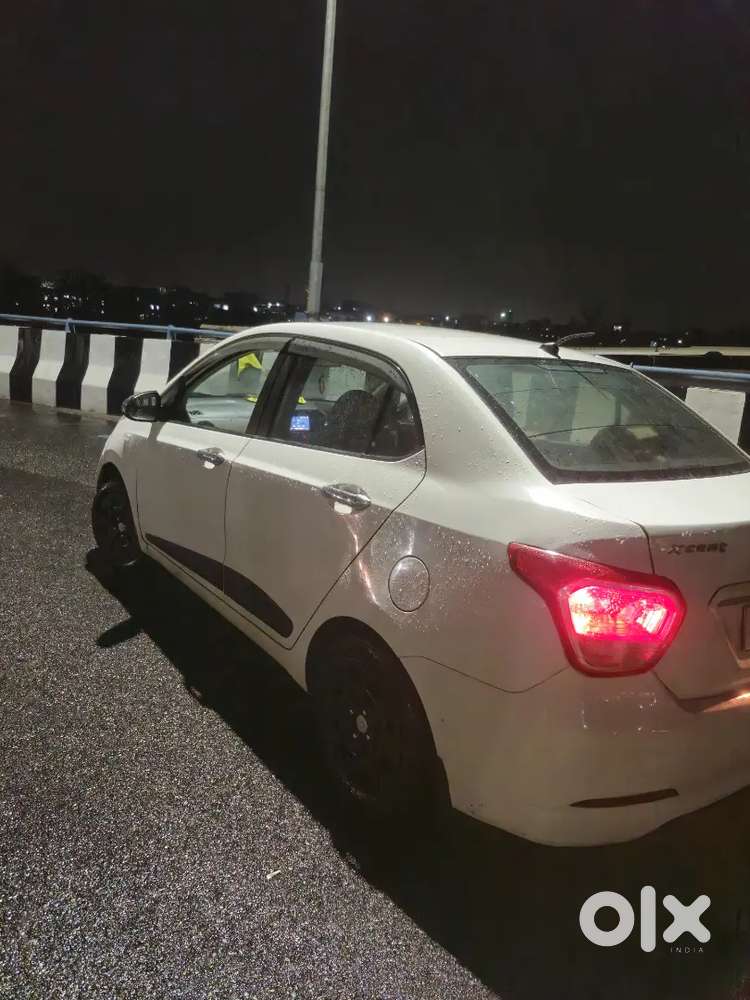 Petrol + Cng.  White Xcent With Complete Document Good Tyre Condition