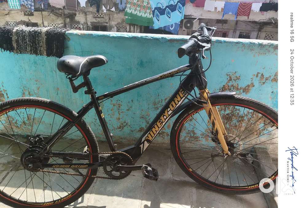 Ninety One Enigma 700C Single Speed Black Yellow Electric Cycle.