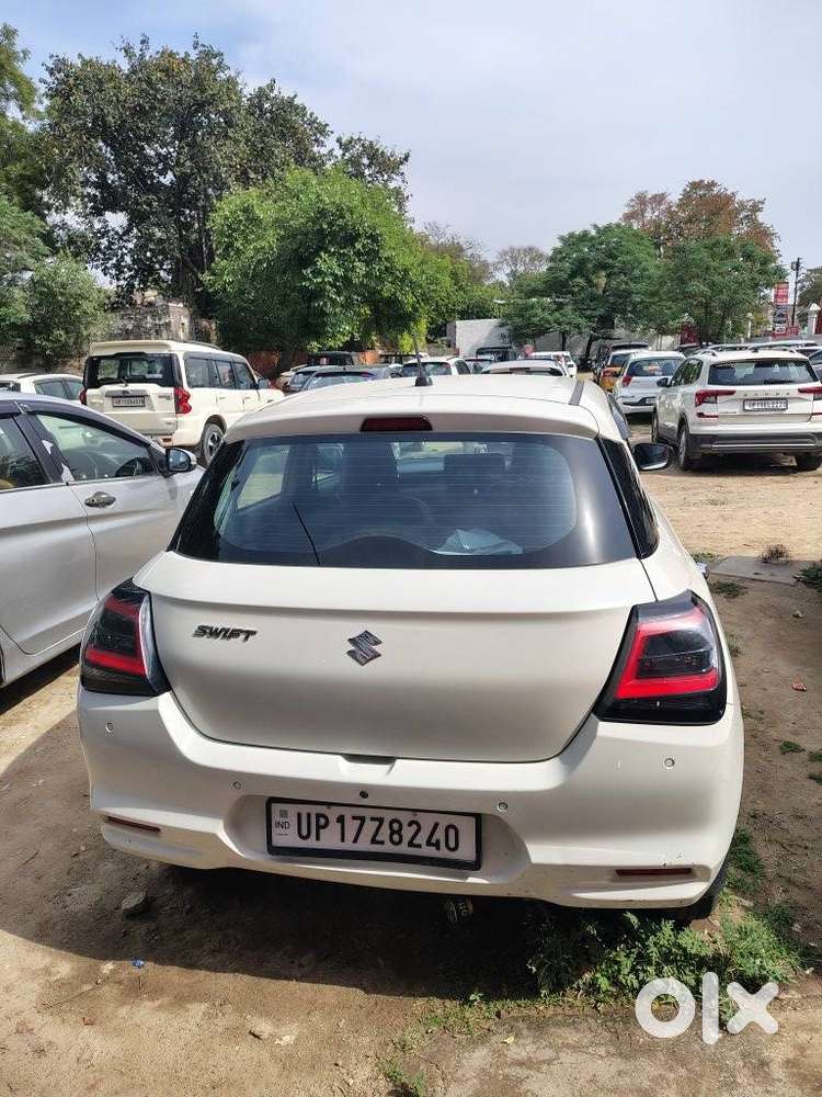 Maruti Suzuki Swift 1.2 Lxi (o), 2024, Petrol