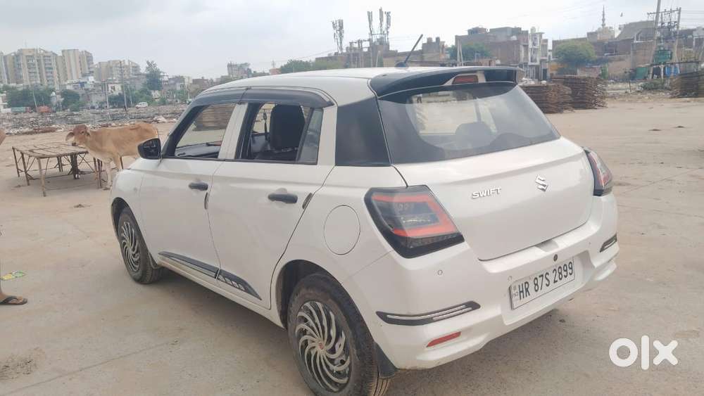 Maruti Suzuki Swift 1.2 Lxi (o), 2024, Petrol