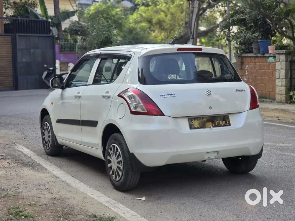 Maruti Suzuki Swift Lxi 2015