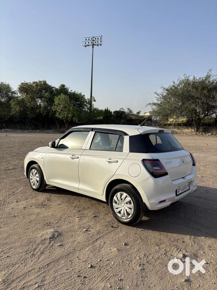 Maruti Suzuki Swift 1.2 Lxi (o), 2024, Petrol