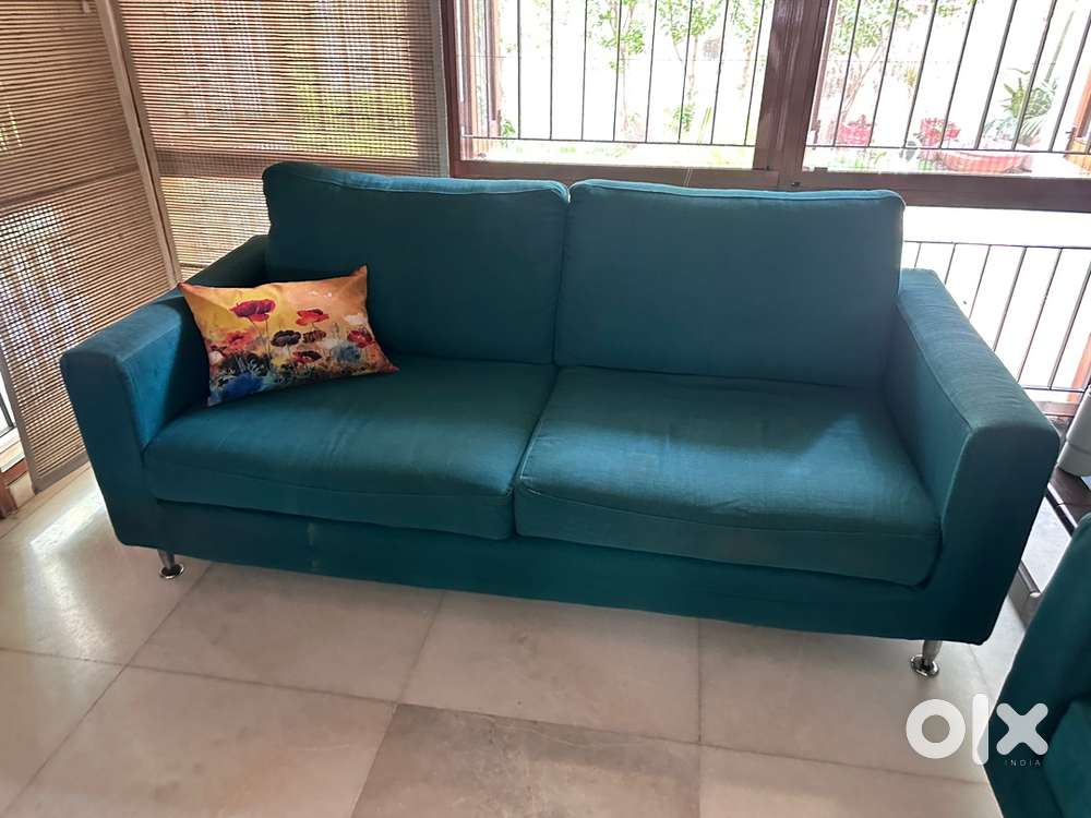 Peacock green sofa