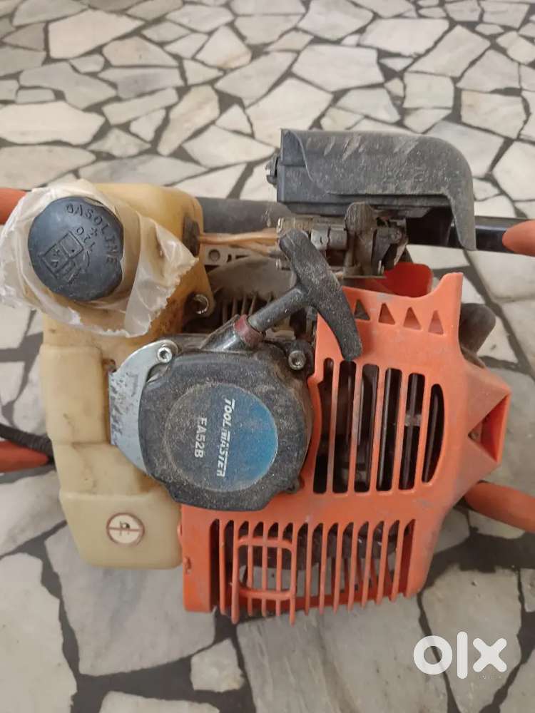 Petrol digging machine with attachment