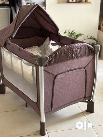 Giggles sales travel cot