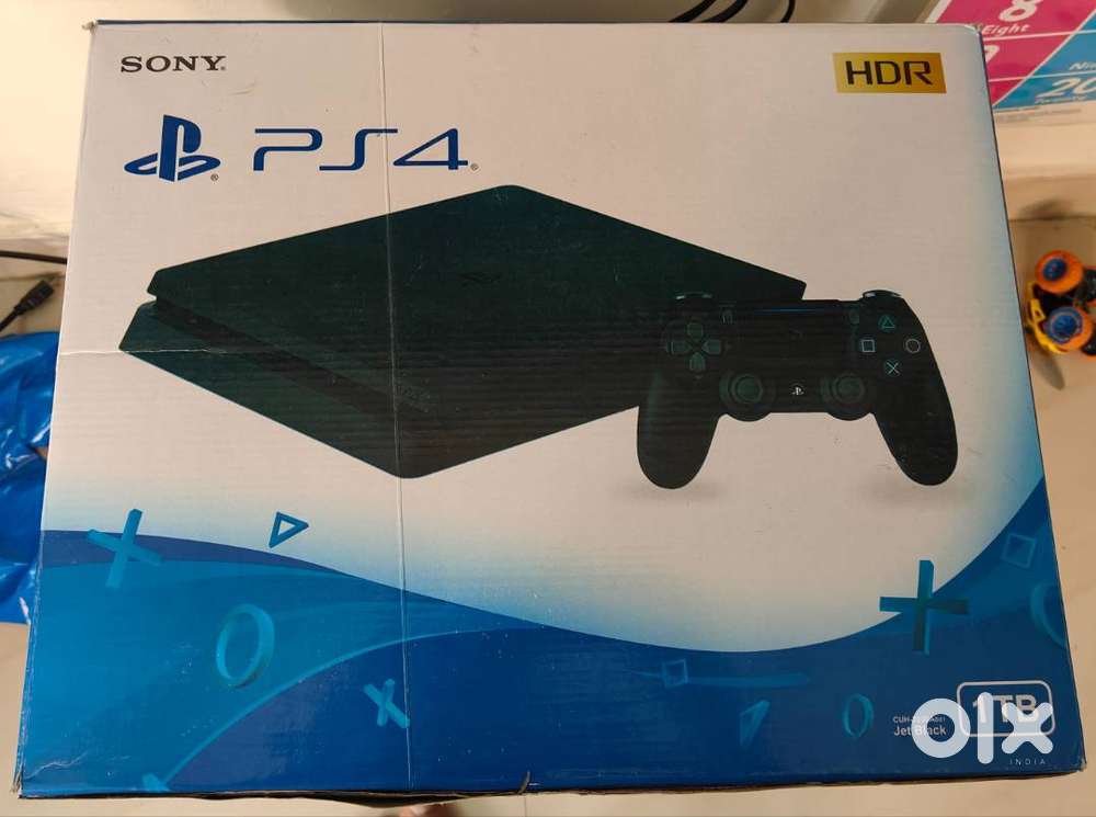 Sony PS4 Slim 1 TB console with box, sony controller & cables