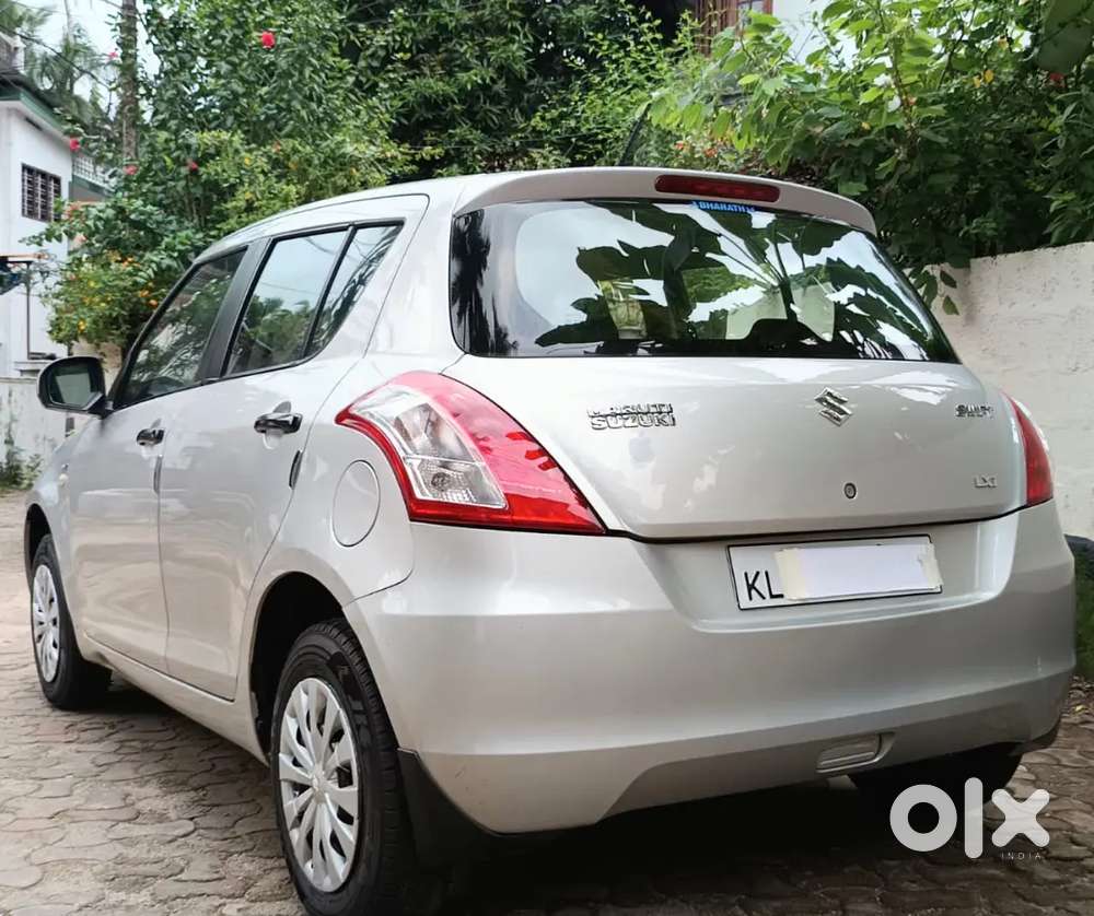 Low Km Driven Single Owner Swift Lxi Full Correct Service